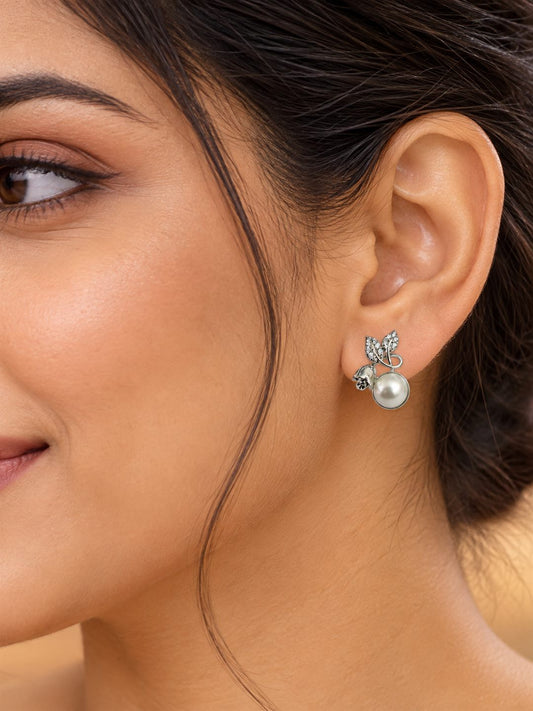 White Pearl-Effect Leaf Stud Earrings, silver plated, model close-up