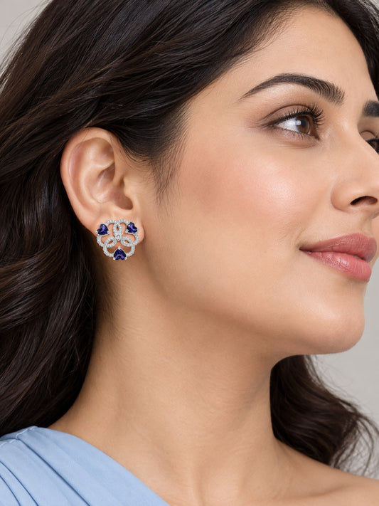 Purple Heart Stone Openwork Floral Stud Earrings in silver plating worn by a model, close-up
