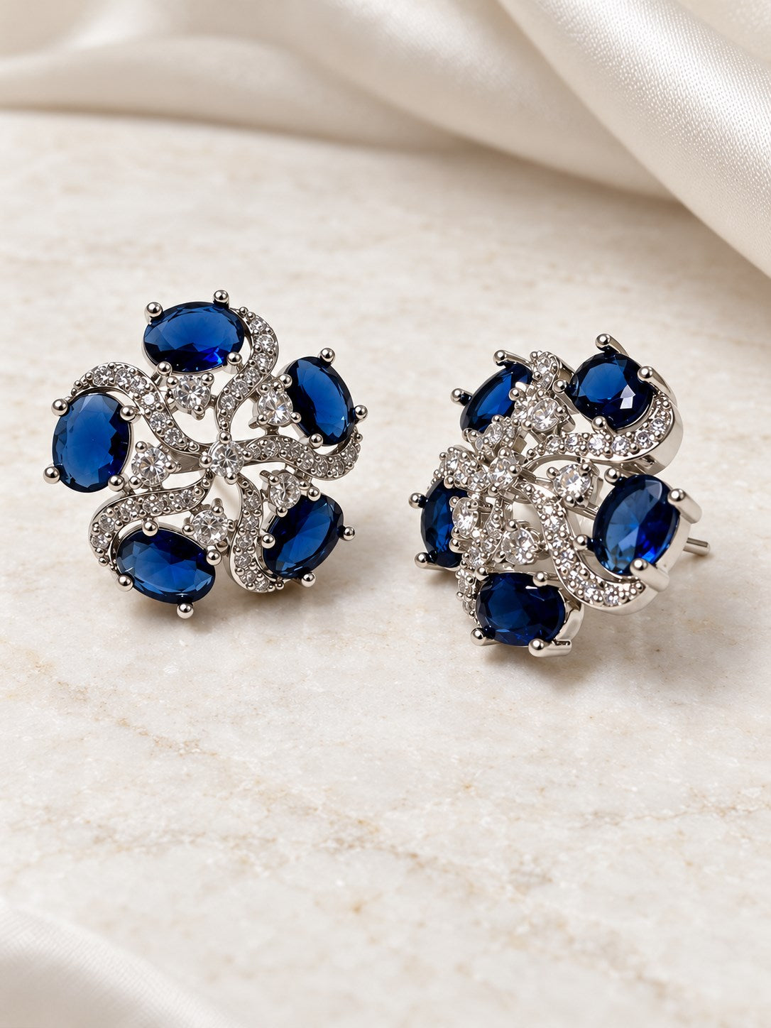 Blue Oval Stone Openwork Floral Stud Earrings in silver plating