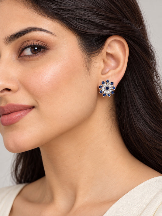 Blue Baguette Sunburst Stud Earrings, silver plated, model close-up