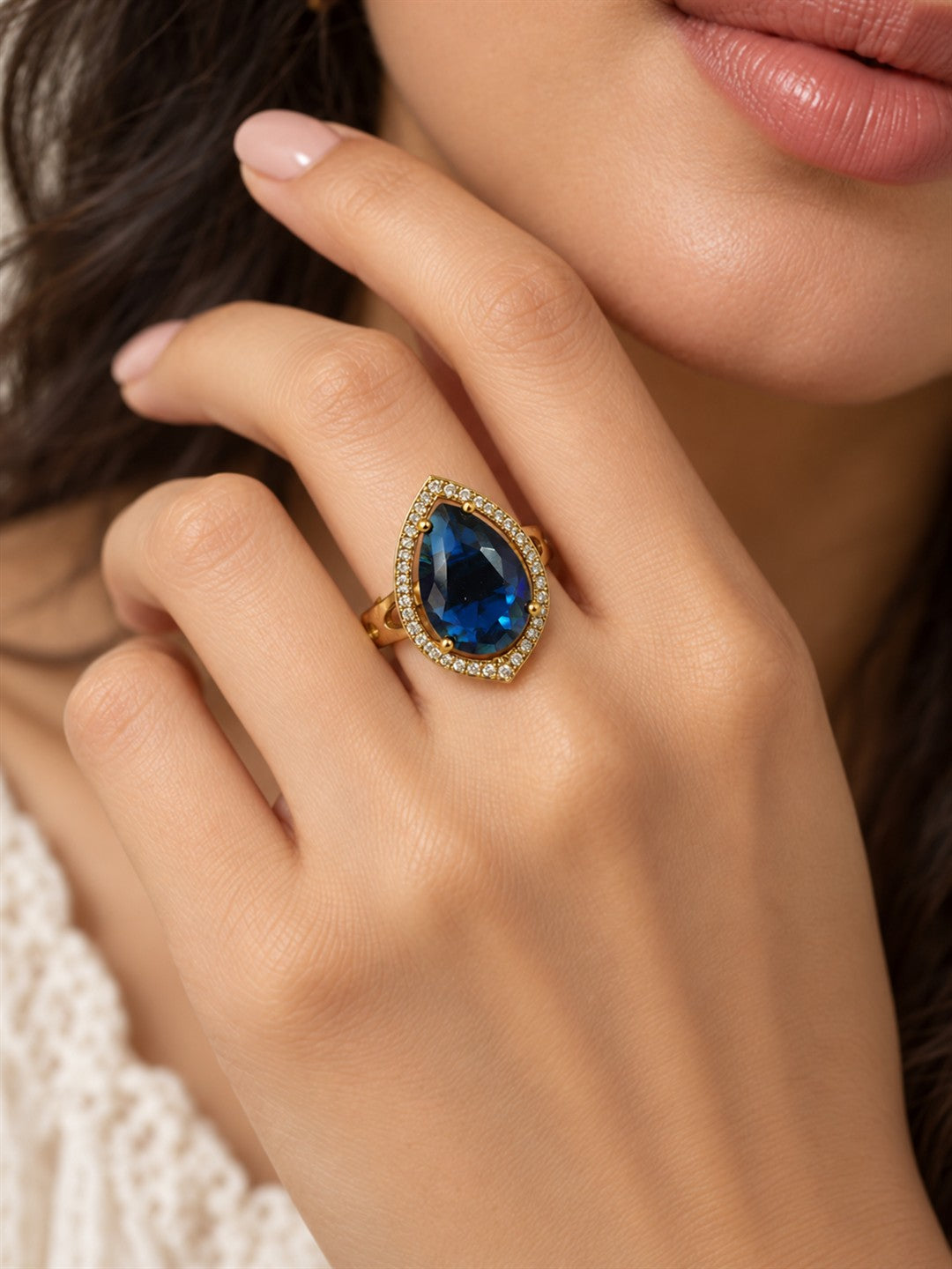 Blue Teardrop Stone Halo Ring - Gold Plated, model close-up