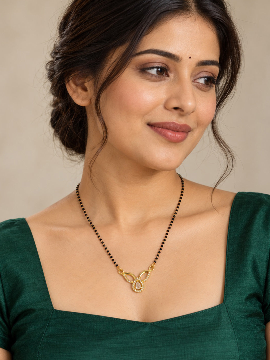 White teardrop and open leaf gold-plated mangalsutra