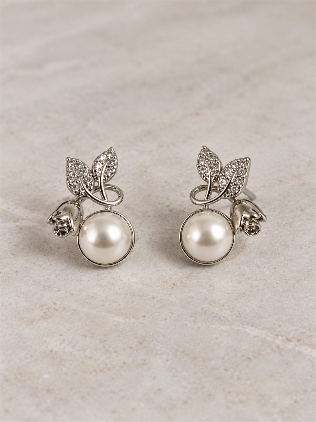 White Pearl-Effect Leaf Stud Earrings, silver plated, lifestyle view