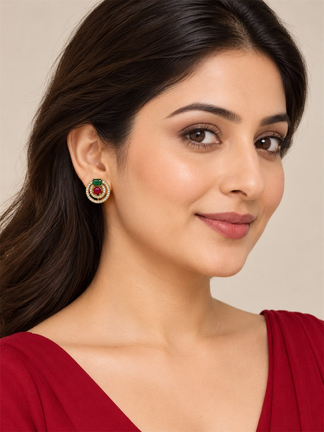 Green and Red Stone Double Halo Stud Earrings, gold plated, styled on model