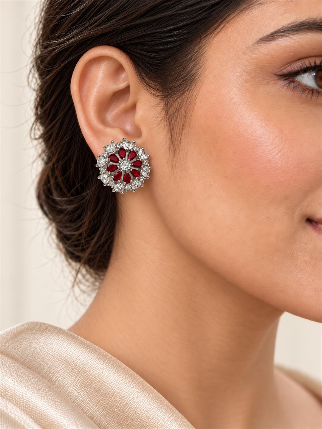 Red heart-petal flower silver-plated stud earrings worn by a model