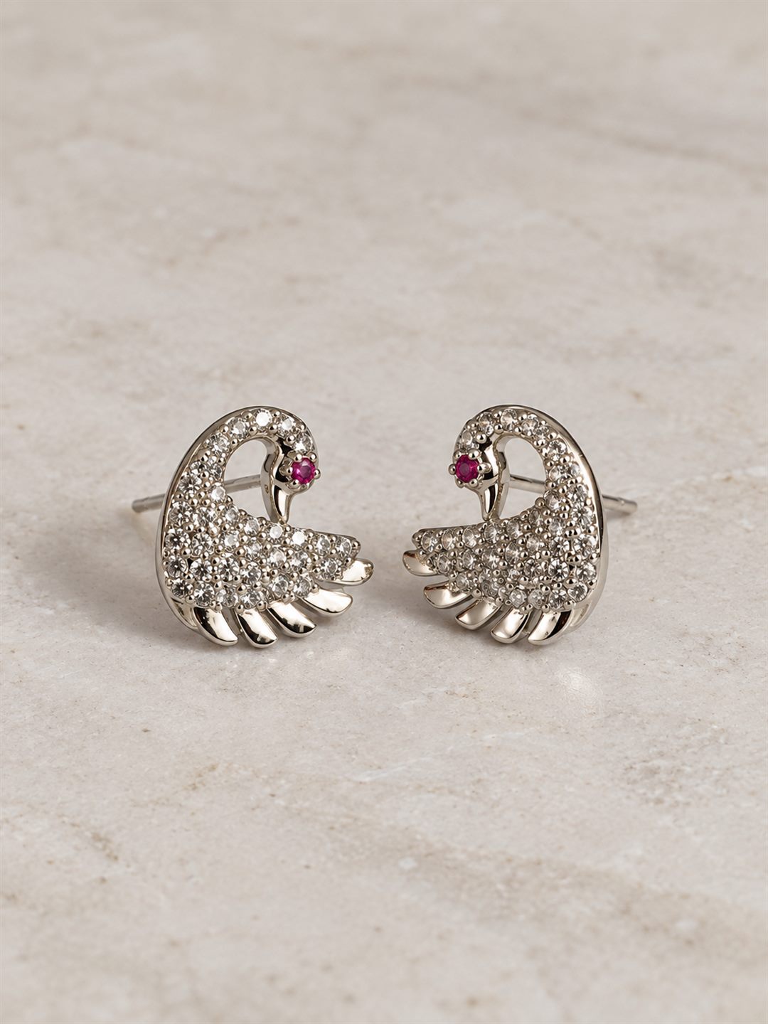 Clear Stone Swan Stud Earrings, silver plated, lifestyle view