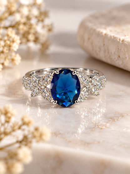 Blue Oval Center Stone Floral Shoulder Ring - Silver Plated