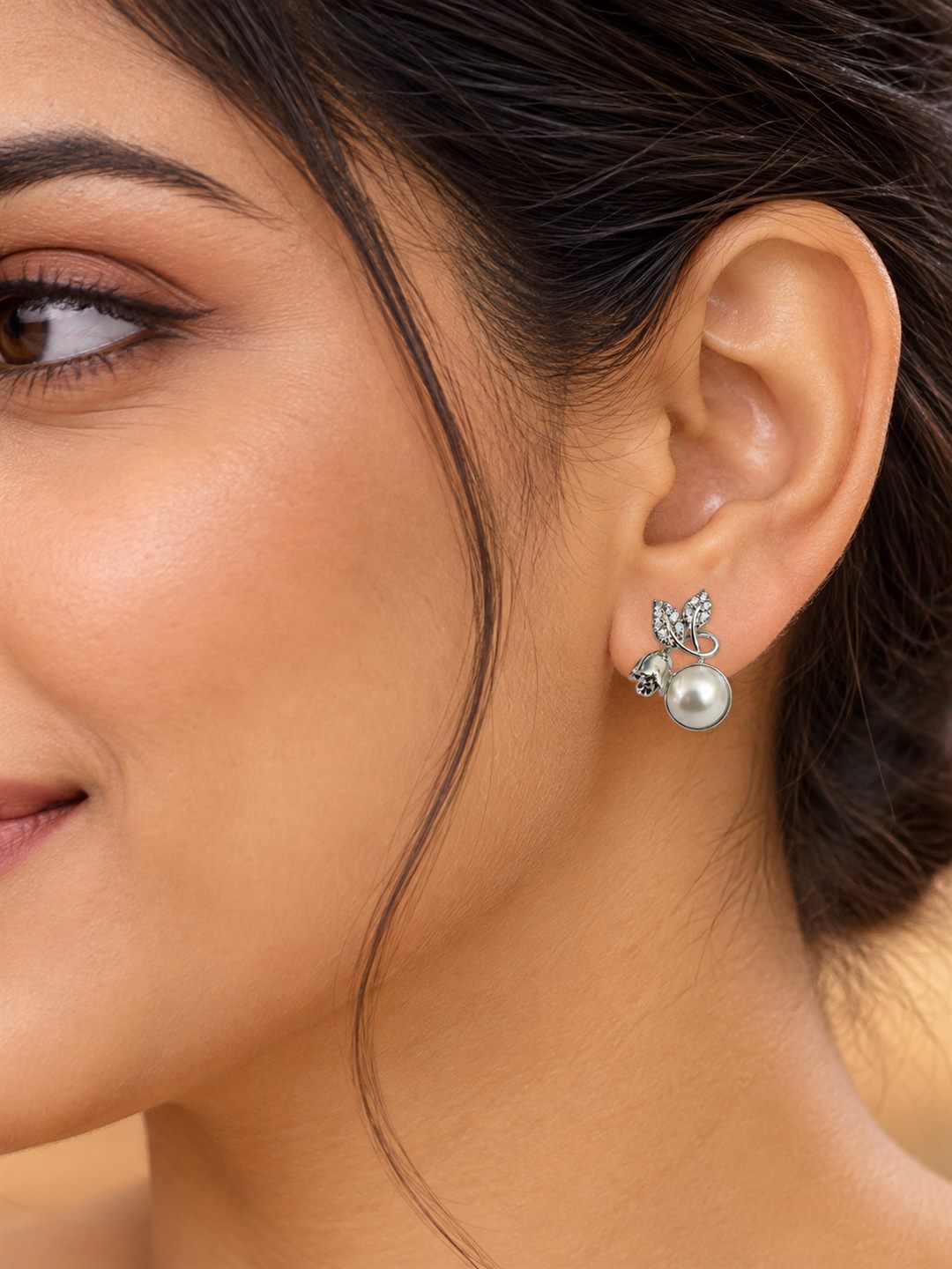 White Pearl-Effect Leaf Stud Earrings, silver plated, model close-up