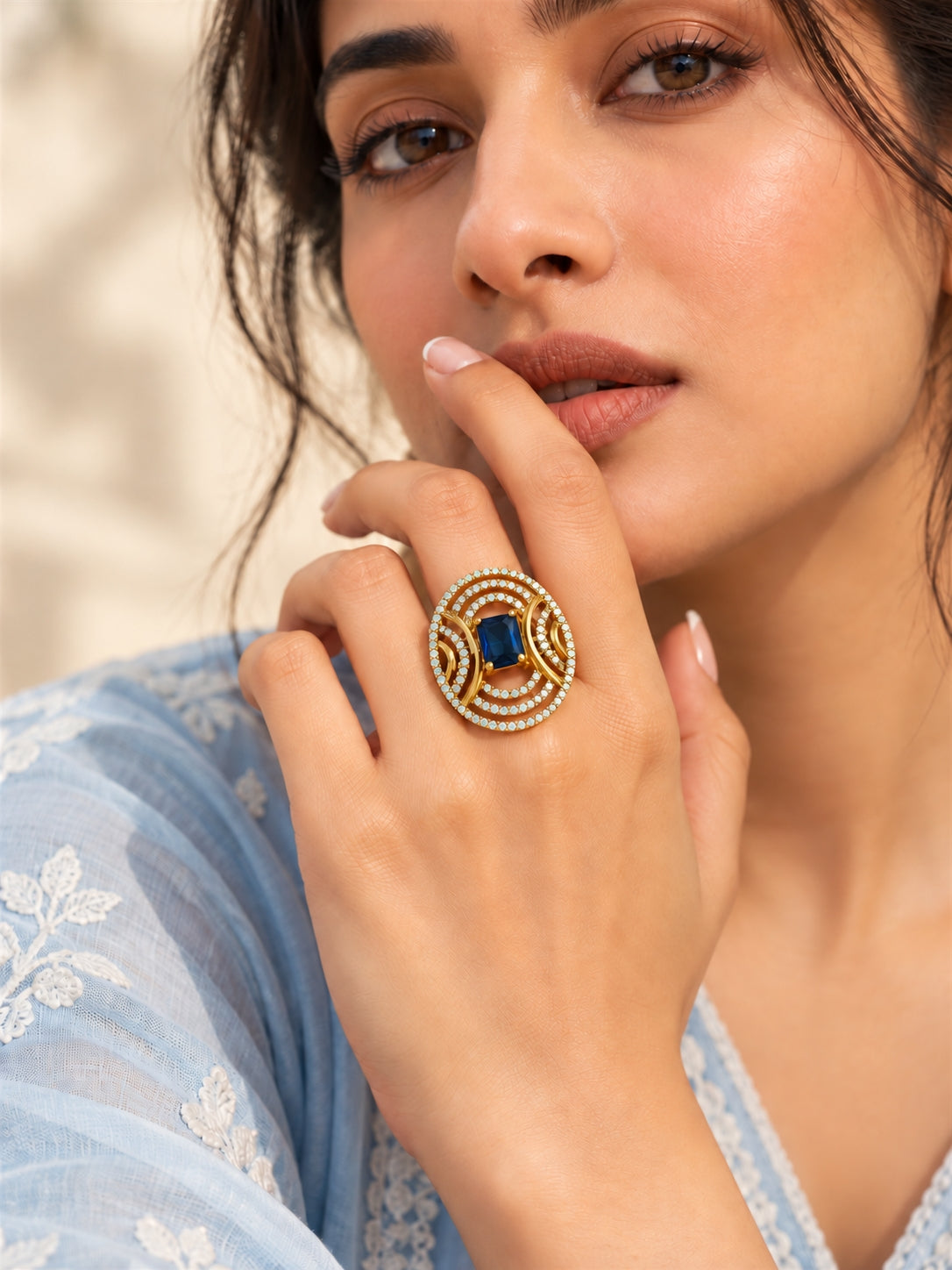 Blue Stone Rectangular Stone Oval Halo Ring - Gold Plated, model close-up
