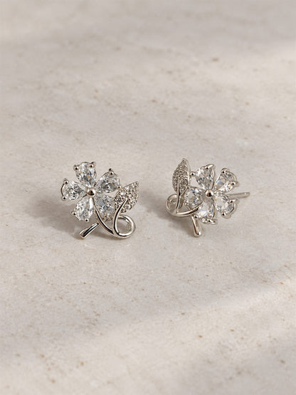 Clear Flower and Leaf Stud Earrings, silver plated, lifestyle view