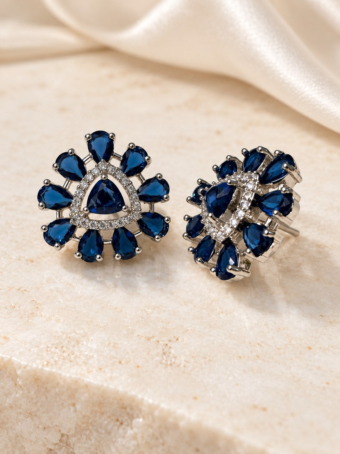 Blue Teardrop Halo Stud Earrings in silver plating