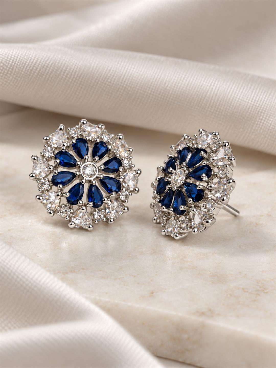 Blue heart-petal flower silver-plated stud earrings