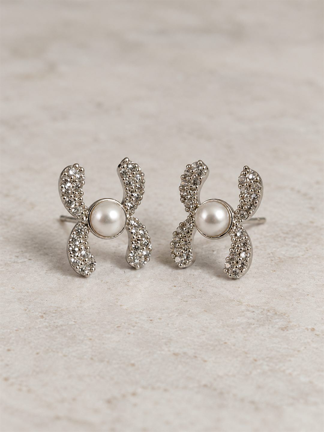White Pearl-Effect Four Petal Stud Earrings, silver plated, lifestyle view