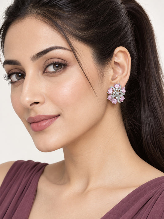 Pink Oval Stone Floral Stud Earrings in silver plating worn by a model, close-up
