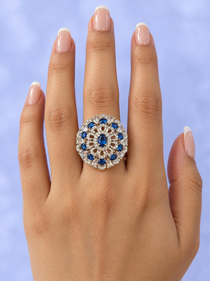 Blue Oval Center Floral Cluster Ring - Silver Plated worn on hand - close-up