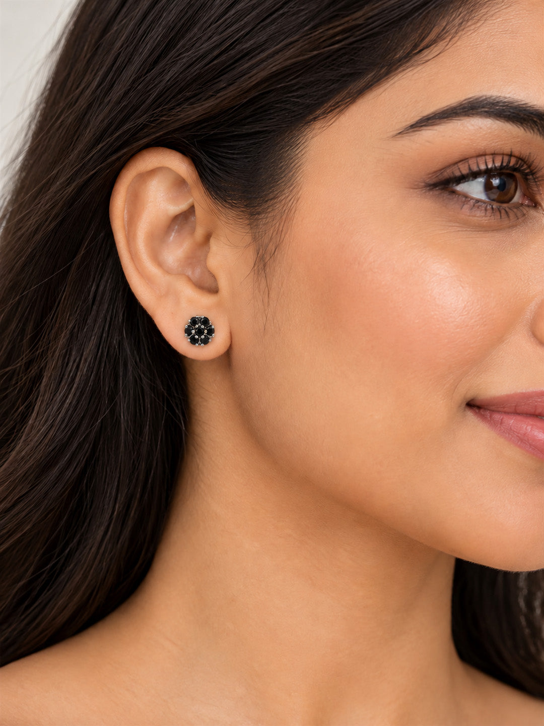Black Stone Floral Cluster Stud Earrings, silver plated, model close-up