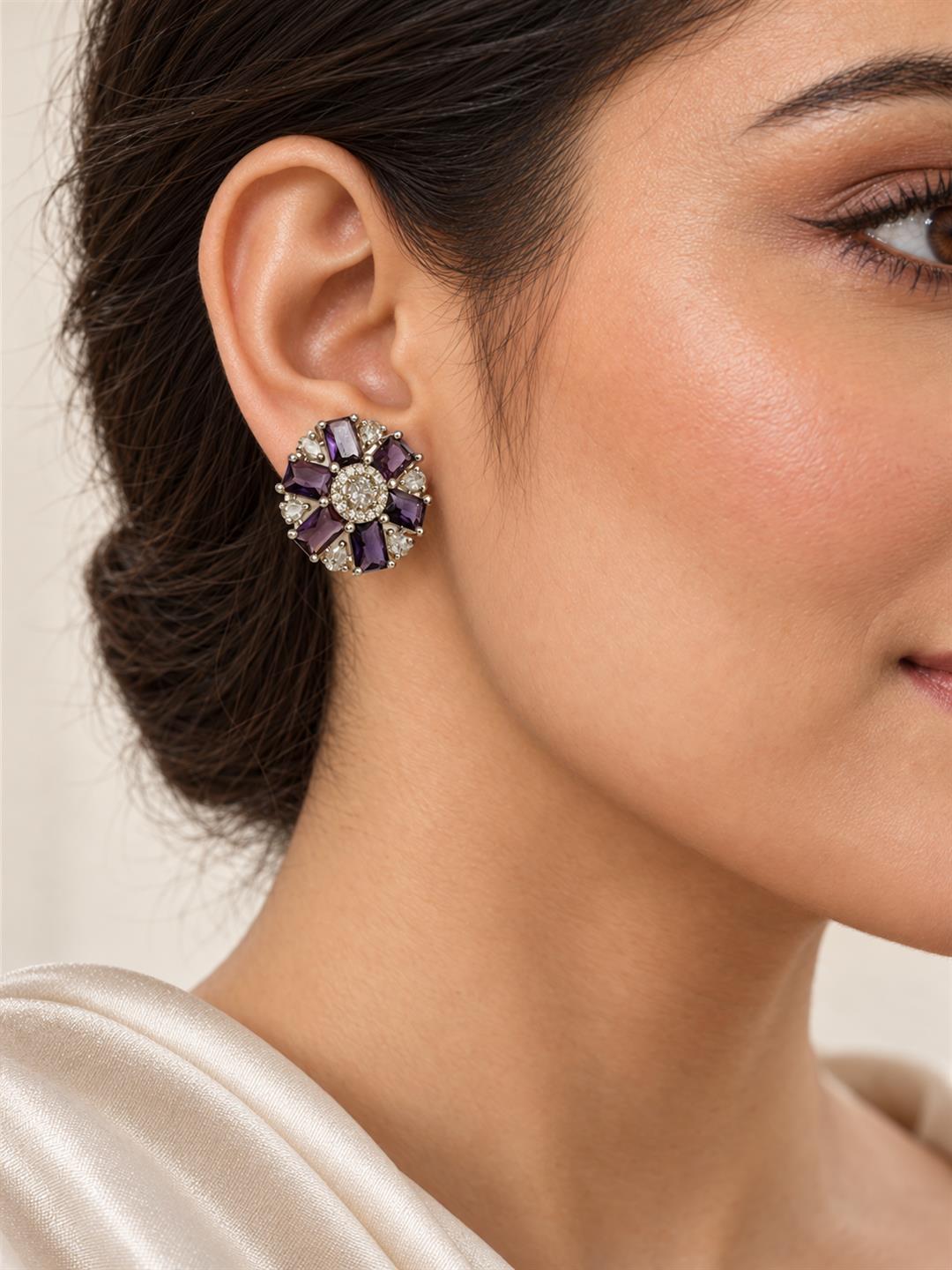 Purple round flower silver-plated stud earrings worn by a model
