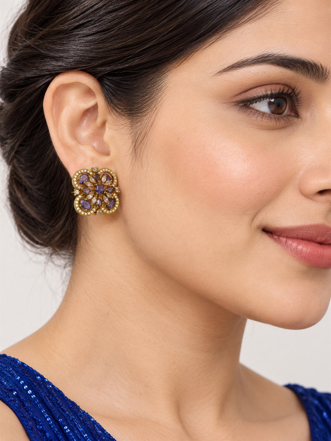 Purple Four Petal Oval Stone Stud Earrings - Gold Plated on a model