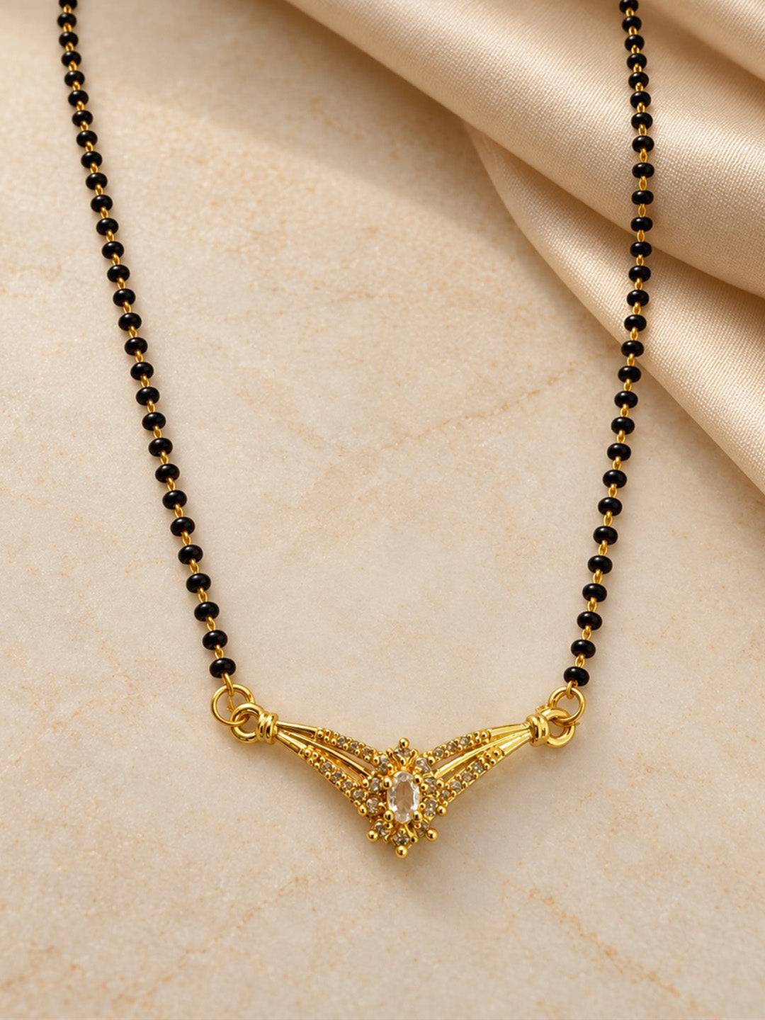 White wing-shaped gold-plated mangalsutra