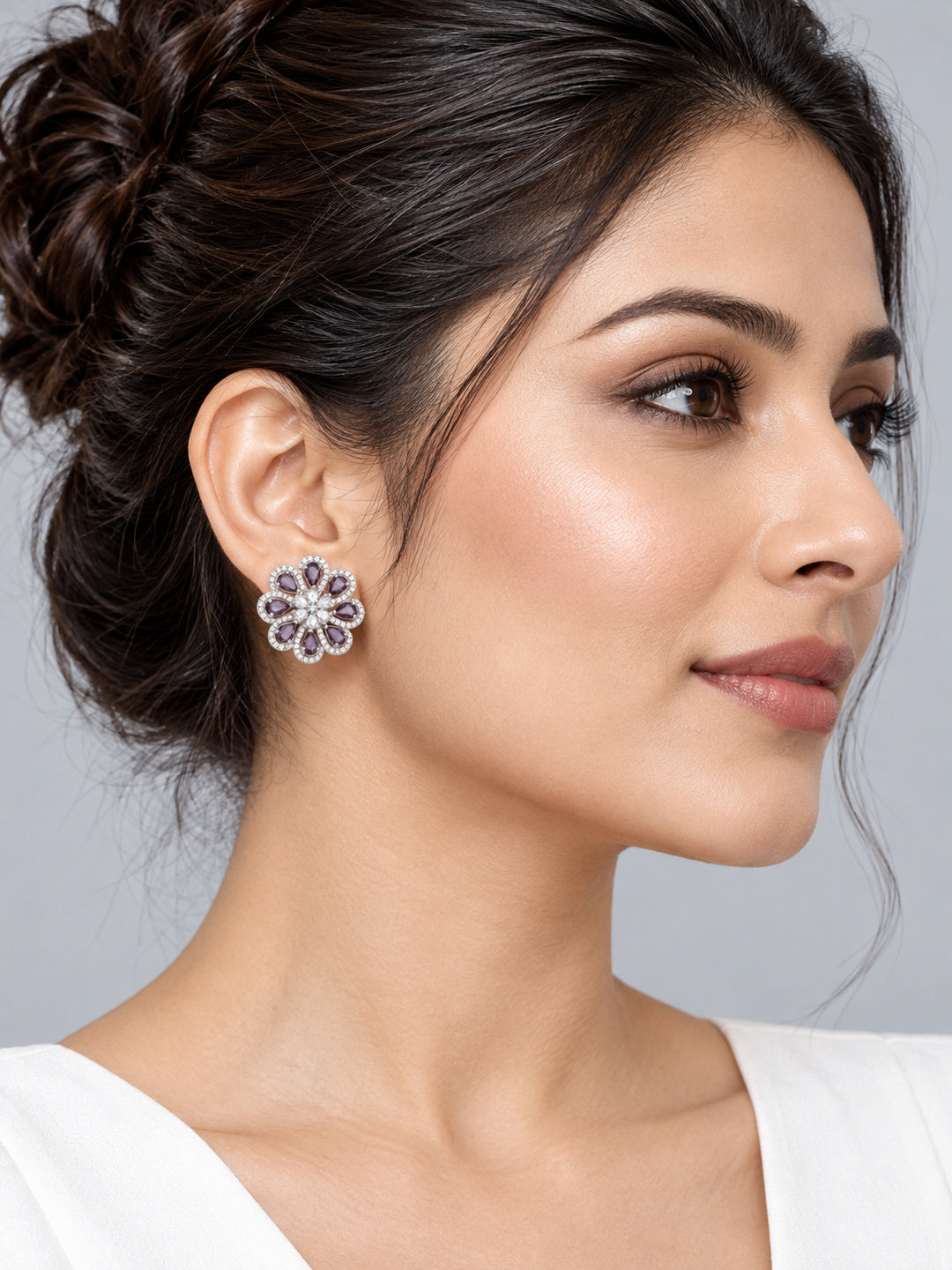 Purple Teardrop Floral Stud Earrings in silver plating worn by a model, close-up