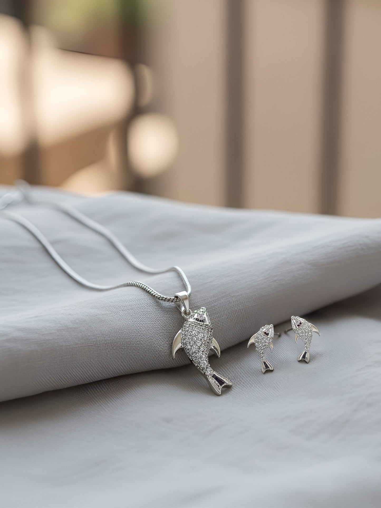 Silver Plated AD Studded Fish Pendant And Earrings Set for Women
